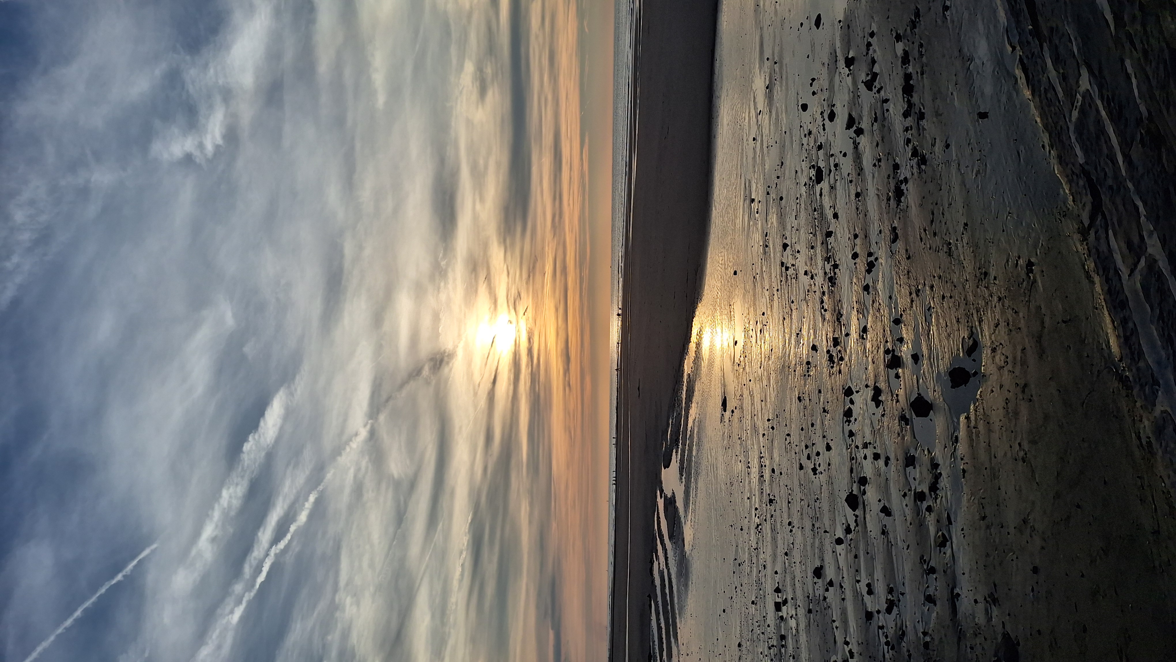 Zonsondergang aan het strand